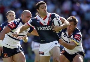 Anthony Minichiello makes a break for the Roosters:  NRL Round 26, Roosters v Cowboys, Sydney Football Stadium, Sunday 6th September 2009. 
