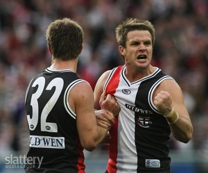 Adam Schneider and Andrew McQualter of St Kilda Saints celebrate a goal during their AFL 1st Qualifying Final victory over Collingwood Magpies
