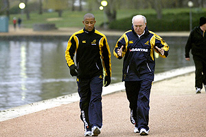 Wallabies captain George Gregan (right) joins Prime Minister John Howard on his early morning walk in Canberra, Wednesday, Aug 16, 2006. The Wallabies will play the All Blacks in new Zealand on Saturday in the Tri - Nations Cup. AAP Image/Alan Porritt