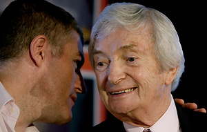 Australian cricket commentator Richie Benaud talks to Stuart McGill (left) at the annual cricket legends lunch in Sydney on Friday, Feb. 20, 2009. AAP Image/Jenny Evans