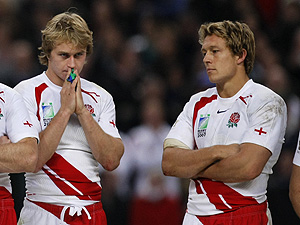 England's Mathew Tait, left, and Jonny Wilkinson react on the podium after the Rugby World Cup final match between England and South Africa at the Stade de France stadium in Saint Denis, outside Paris, Saturday Oct.20, 2007. South Africa won the match 15-6. AP Photo/Matt Dunham