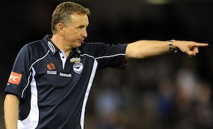 Former Melbourne Victory coach Ernie Merrick barks out orders to his players. AAP Image/Joe Castro