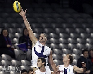 Fremantle's Aaron Sandilands flies for a ball during the AFL Round 15 match between the Richmond Tigers and the Fremantle Dockers at Etihad Stadium, Melbourne.