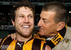 Campbell Brown (L) of Hawthorn is embraced by President Jeff Kennett