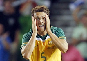 Australia's James Holland reacts after Slovenia's second goal against his team