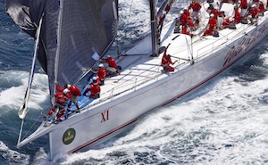 Wild Oats Xl sails  out of Sydney Harbour after the start of the Rolex Sydney to Hobart Yacht race