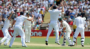 England celebrate as Australia's Xavier Doherty is bowled by England's Graeme Swann. AAP Image/Dean Lewins