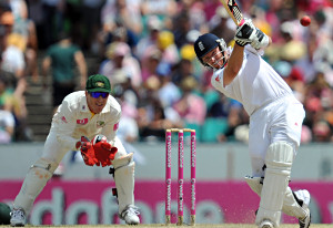 England's Ian Bell (right) hits a shot off the bowling of Australia's Steve Smith as Brad Haddin (left) looks on during play on day 3 in the Fifth Ashes Test between Australia and England at the Sydney Cricket Ground in Sydney on Wednesday, Jan. 5, 2011. (AAP Image/Paul Miller)