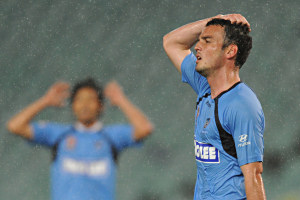 Sydney FC's Mark Bridge shows his disappointment after a missed opportunity during their A-League match against the North Queensland Fury at the Sydney Football Stadium, Wednesday, Sept. 29, 2010. (AAP Image/Dean Lewins)