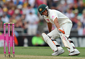 Australian batsman Usman Khawaja prepares to ground his bat to complete his first run in international cricket during play on Day 1 in the Fifth Ashes Test between Australia and England at the Sydney Cricket Ground in Sydney on Monday, Jan. 3, 2011. (AAP Image/Paul Miller)