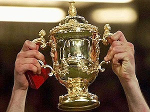Australia's captain John Eales holds aloft the Webb Ellis trophy after his side won the final of the Rugby World Cup.