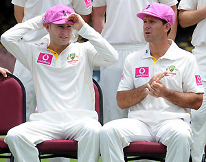 Injured Australian captain Ricky Ponting (right) and acting captain Michael Clarke (left)