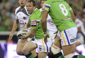 Matt Orford passes the ball during the NRL round two.