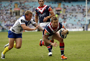 Todd Carney scores a try for the Roosters during the NRL Round 3, Bulldogs v Roosters, ANZ Stadium, Sydney, Sunday, March 27, 2011. (AAP Image/Action Photographics/Renee McKay)
