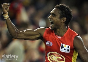 Liam Patrick of the Suns celebrates a goal during the AFL Round 07 match between the Gold Coast Suns and the Brisbane Lions at the Gabba, Brisbane.