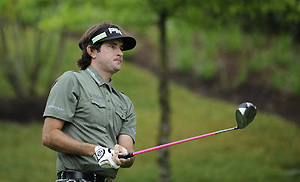 Bubba Watson watches his drive from the 11th tee. AP Photo/Nick Wass