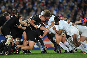 France (right) and New Zealand All Blacks scrum during the 2011 Rugby World Cup. AAP Image/AFP, Franck Fife