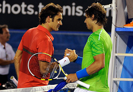 Roger Federer congratulates Rafael Nadal after their Australian Open match