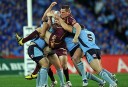 Brent Tate is tackled by Greg Bird
