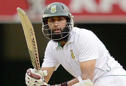 South African batsman Hashim Amla looks on after playing a shot during day 1 of the first test match against Australia at the Gabba.