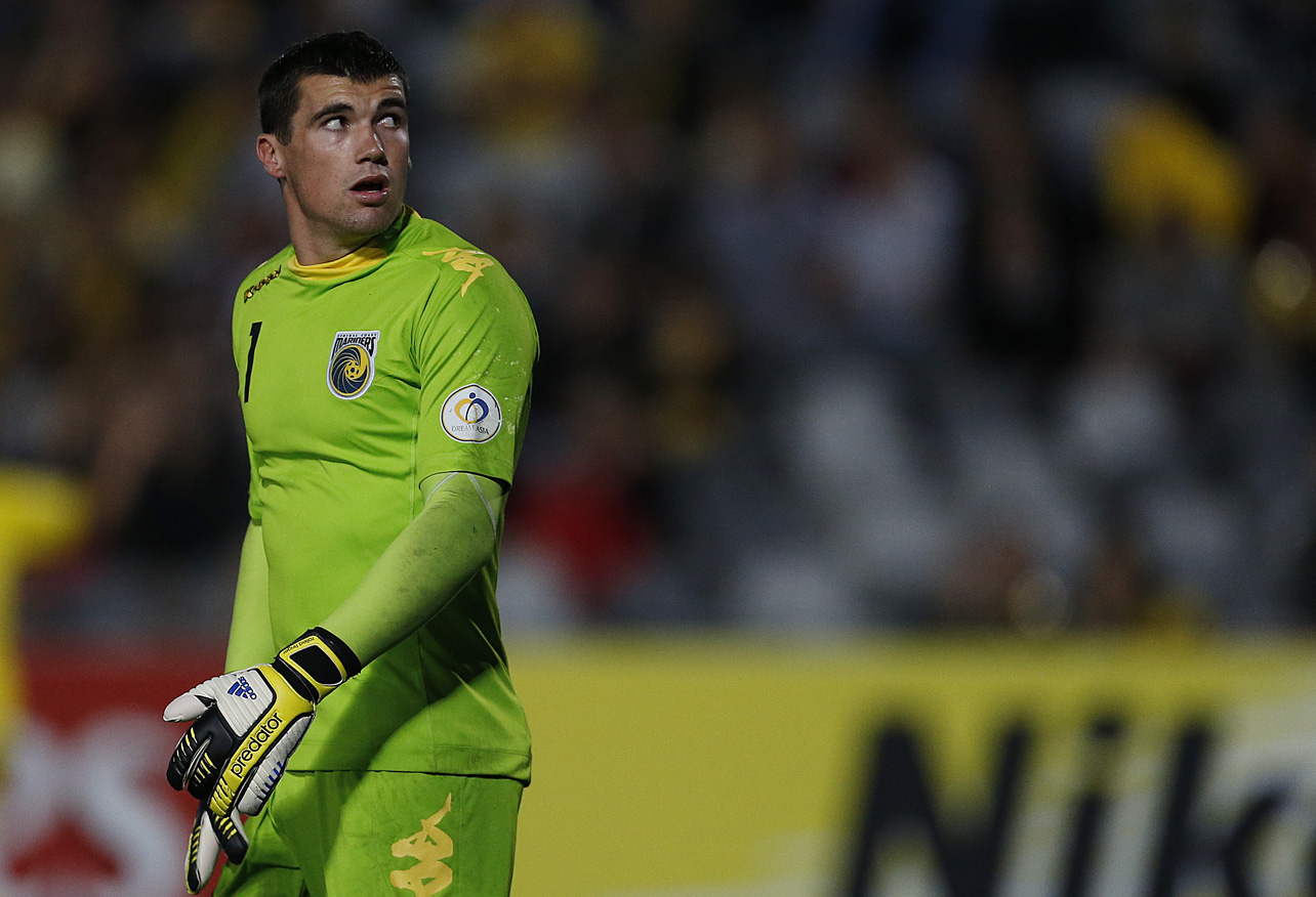 Mat Ryan of the Central Coast Mariners checks the scoreboard during the AFC Champions League Group H match against Kashiwa Reysol. Photo: Paul Barkley/LookPro