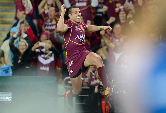 Queensland's Darius Boyd celebrates scoring a try during 2013 State of Origin Game 2
