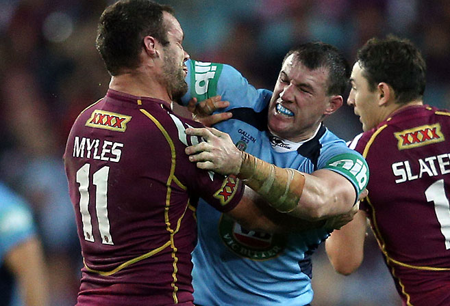 Paul Gallen (c) and Nate Myles fight during the opening match of the 2013 State of Origin.