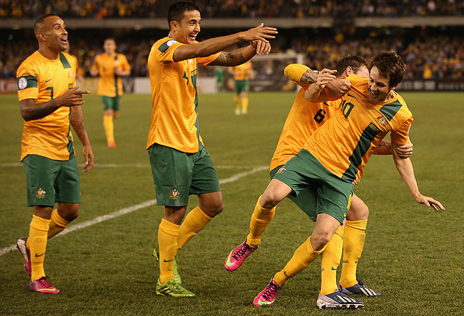 Robbie Kruse (right) of Australia. (AAP Image/Mark Dadswell)