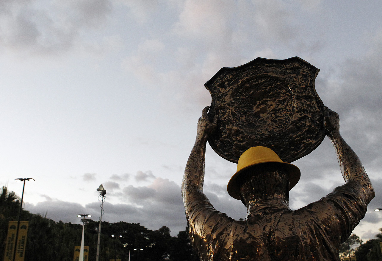 The Wally Lewis statue at the entrance to Suncorp Stadium is decorated with a Wallabies hat.