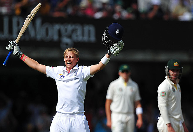 England's Joe Root celebrates his century during play on Day 3 of the second Ashes Test at Lords. AFP PHOTO / CARL COURT