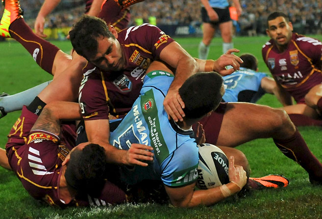 NSW Blues' James McManus scores a try during 2013 State of Origin Game 3