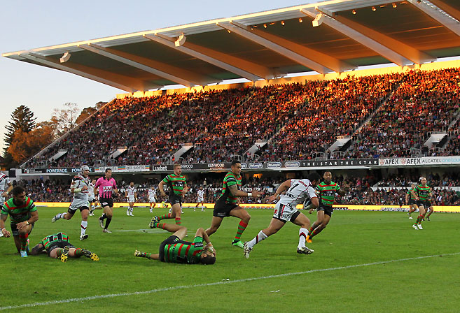 Konrad Hurrell scores in front of a ground record crowd during the Round 17 NRL match between the South Sydney Rabbitohs and the New Zealand Warriors at NIB Stadium in Perth