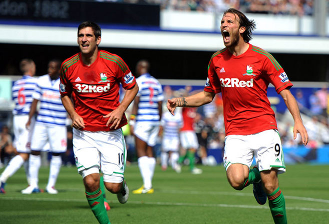 Swansea City striker Miguel Michu celebrates scoring on the opening day of the 2012/13 season.