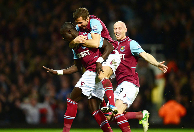 West Ham players celebrate with Mohamed Diame.