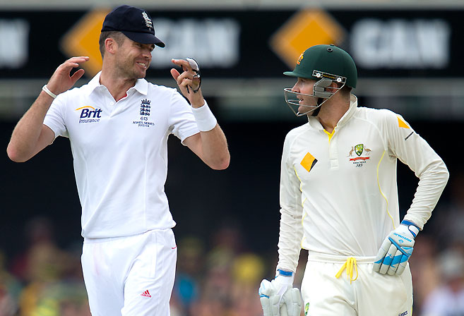 England bowler James Anderson and Australian batsman Michael Clarke share words. (AAP Image/Dave Hunt)