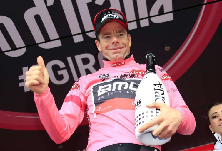 Australian Cadel Evans celebrates the pink jersey