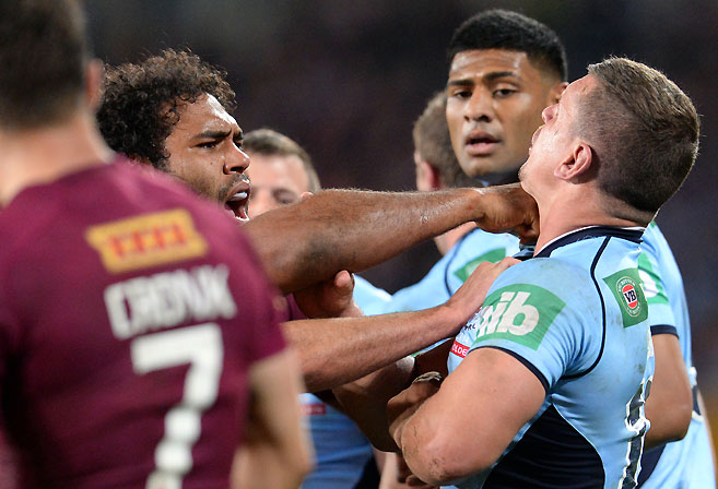 Queensland Maroons player Sam Thaiday (left) pushes NSW Blues player Greg Bird with his fist during Game III of the 2014 State of Origin rugby league series at Suncorp Stadium in Brisbane, Wednesday, July 9, 2014. (AAP Image/Dan Peled)
