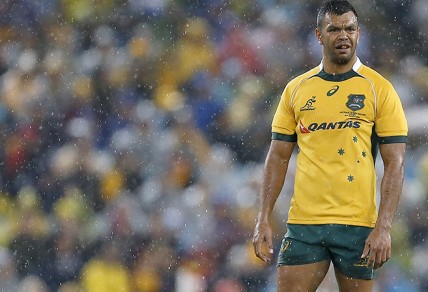Kurtley Beale stands in a rain soaked opening game of the series between the Wallabies and the All Blacks at ANZ Stadium in Sydney, Saturday, Aug. 16, 2014. (Photo: Paul Barkley/LookPro)
