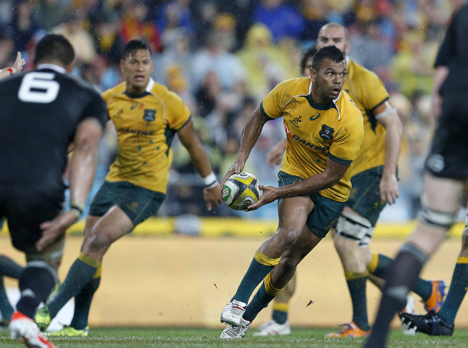 Kurtley Beale shapes to pass during the opening game of the series between the Wallabies and the All Blacks at ANZ Stadium in Sydney, Saturday, Aug. 16, 2014. (Photo: Paul Barkley/LookPro)