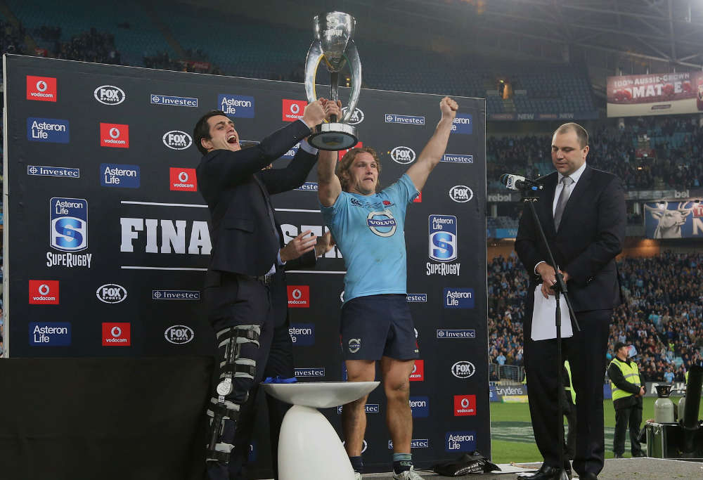 Dave Dennis and Michael Hooper lift the Super Rugby trophy