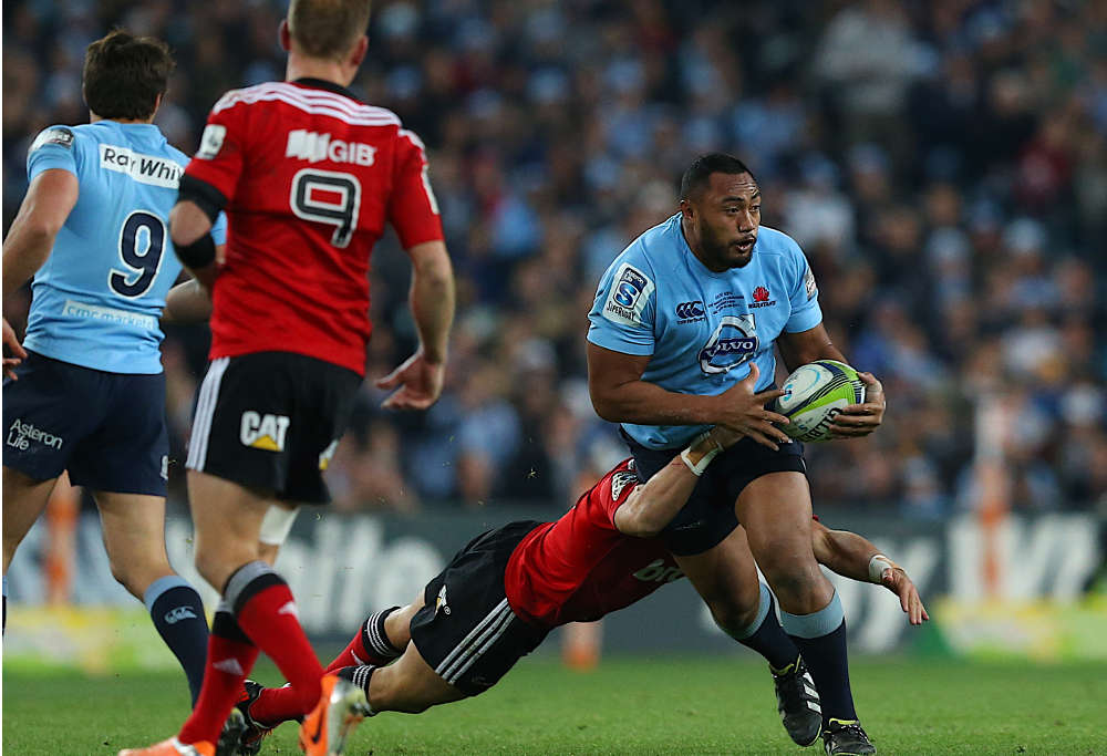 Kepu looks to offload for the Waratahs