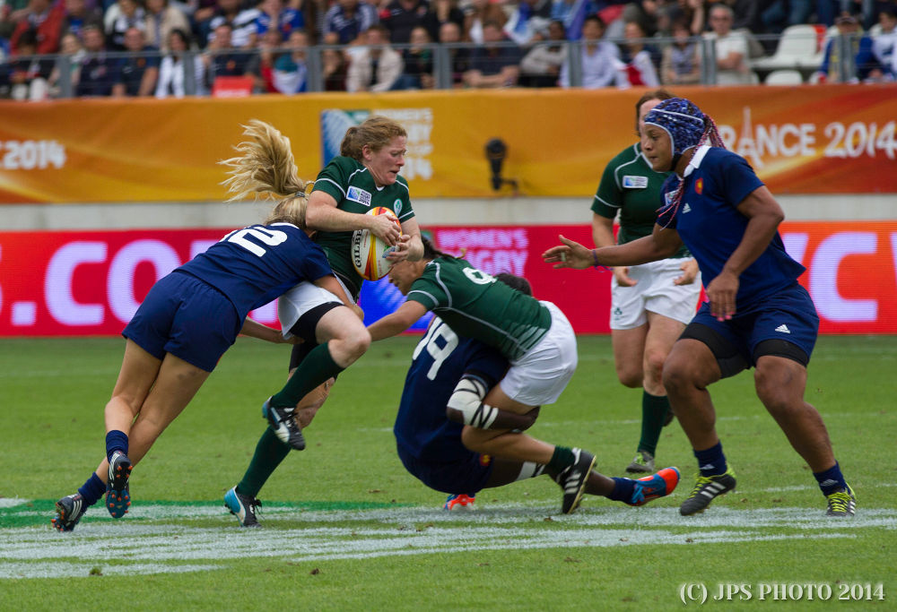 France's Marjorie Mayans helps defend her team's path to victory. Photo: JPS Photo 2014.
