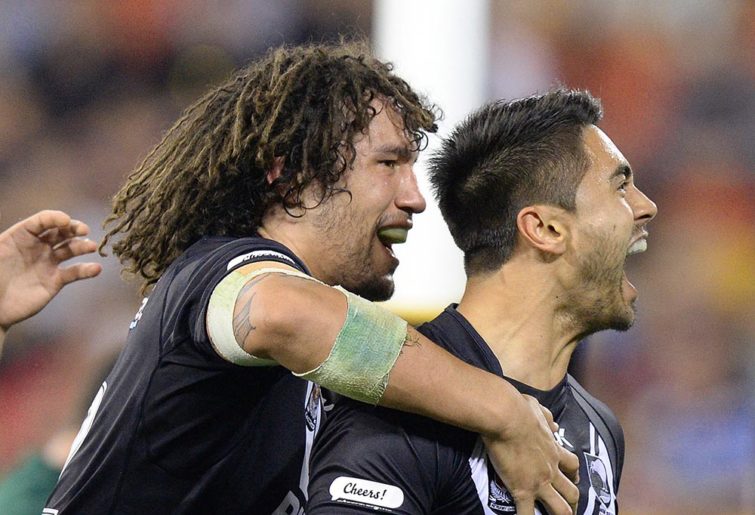 New Zealand's Kevin Proctor (left) celebrates with try-scorer Shaun Johnson during the Four Nations Rugby League match between Australia and New Zealand at Suncorp Stadium in Brisbane, Saturday, Oct. 25, 2014.