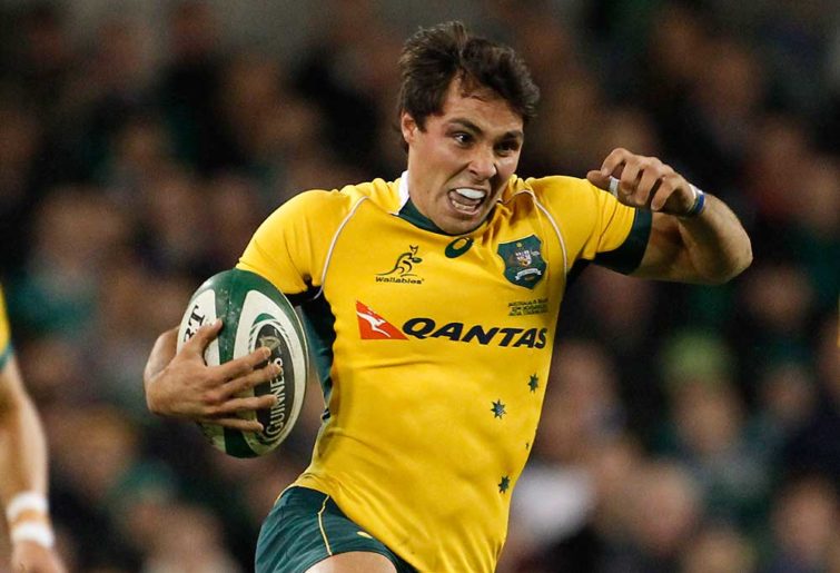 Australia's Nick Phipps is tackled by Ireland's Jonathan Sexton
