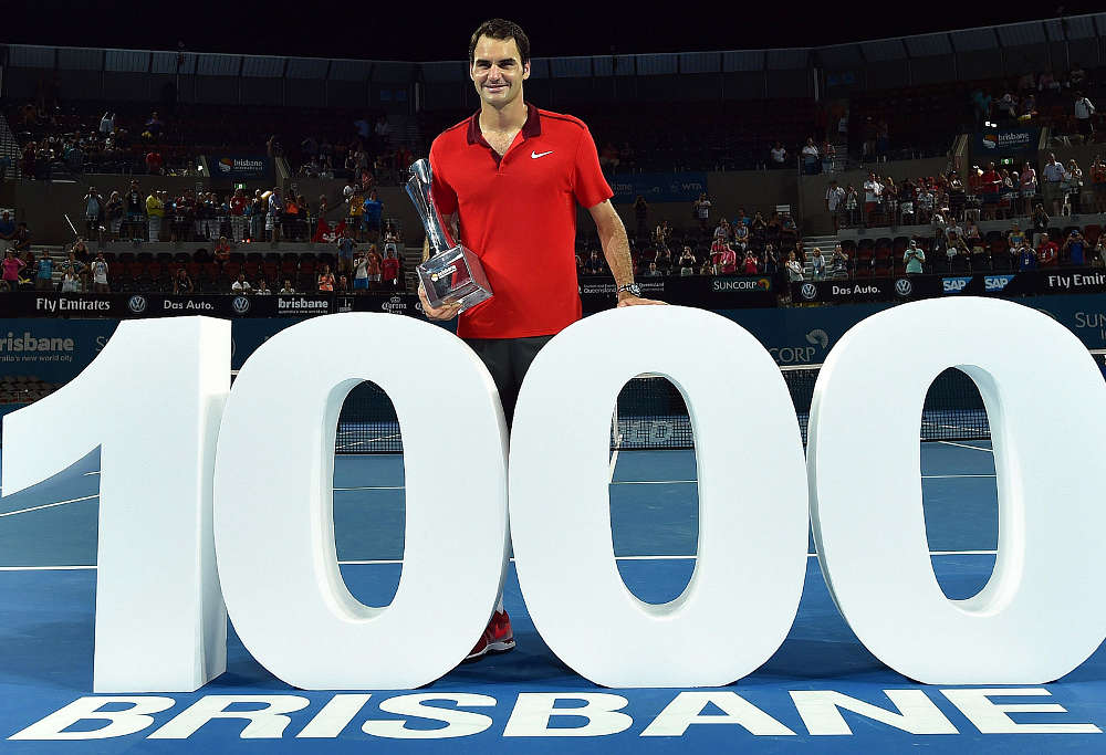 Roger Federer celebrates his 1000th career win