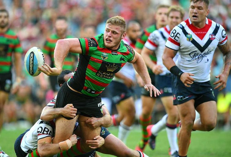 Thomas Burgess of the South Sydney Rabbitohs offloads a pass
