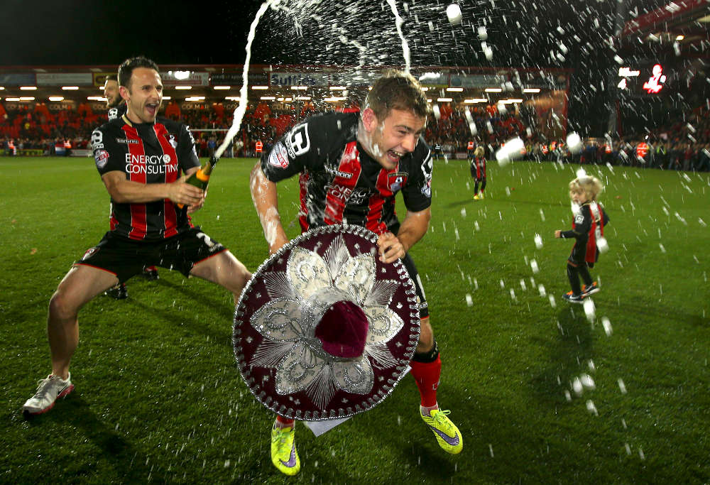 Bournemouth players celebrate promotion to the English Premier League