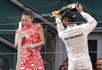 Lewis Hamilton cops spray for champagne shower