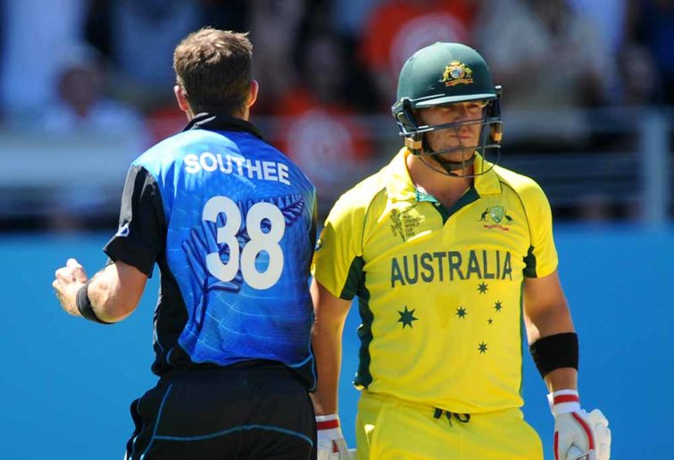 Australian batsman Aaron Finch walks after he is bowled by New Zealand’s Tim Southee
