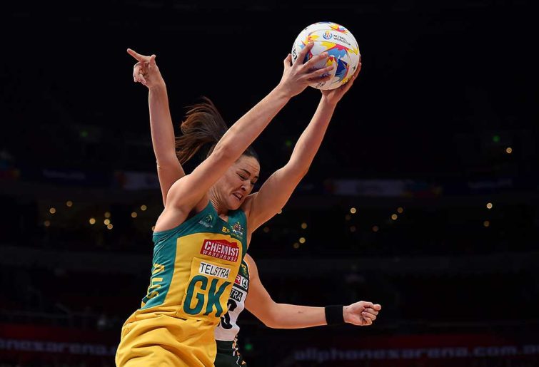 Sharni Layton of Australia competes for the ball with Lenize Potgieter of South Africa